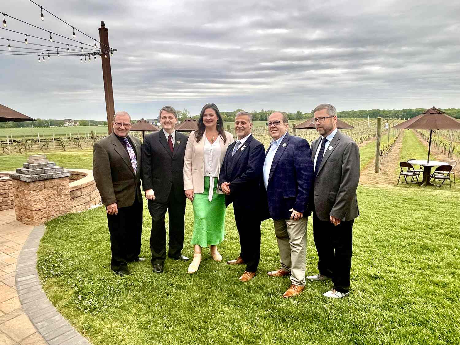 6 commissioners in a field